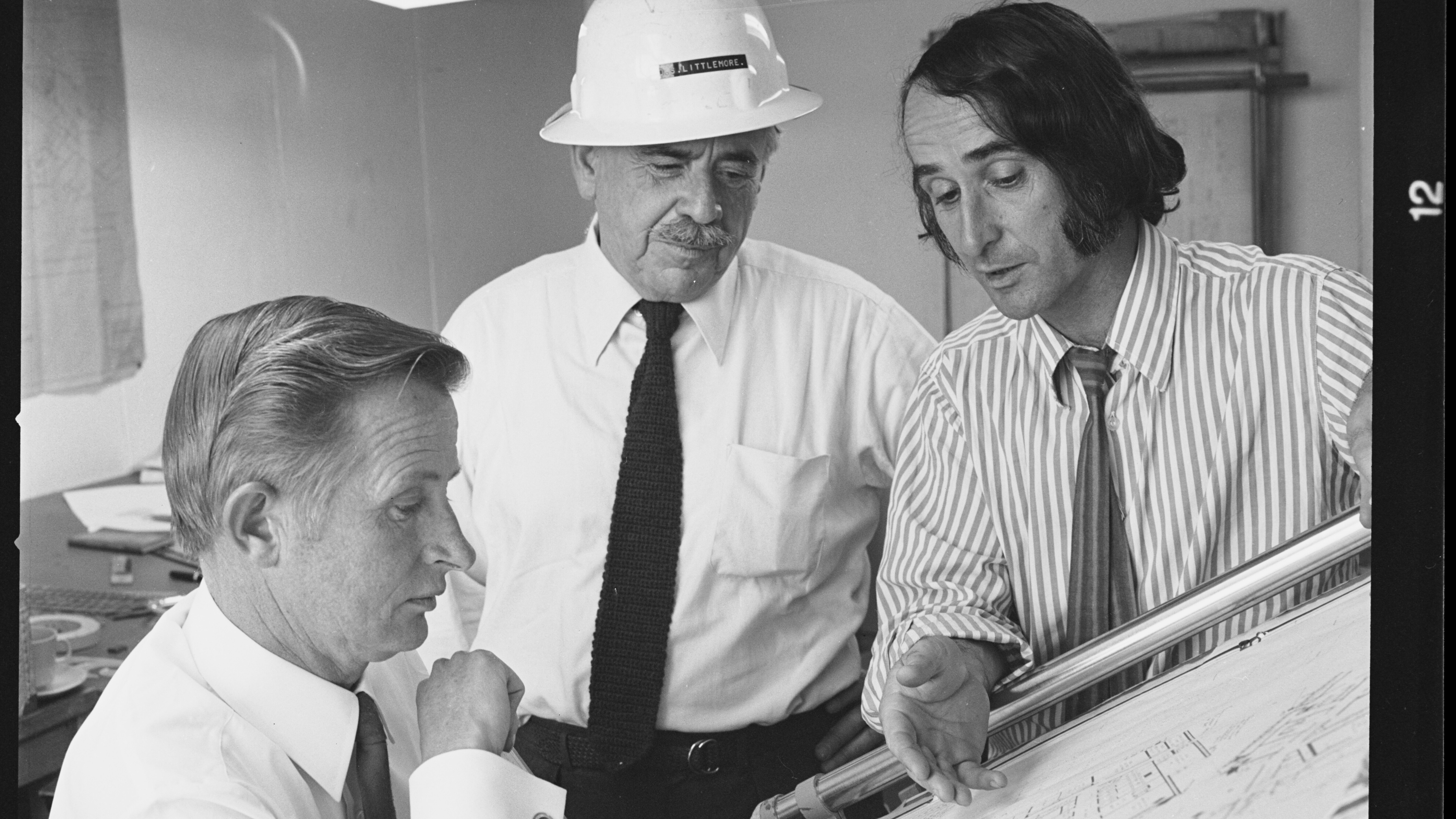 Peter Hall, David Littlemore and Lionel Todd discussing Opera House plans, May 1973, Max Dupain, Mitchell Library, State Library of New South Wales