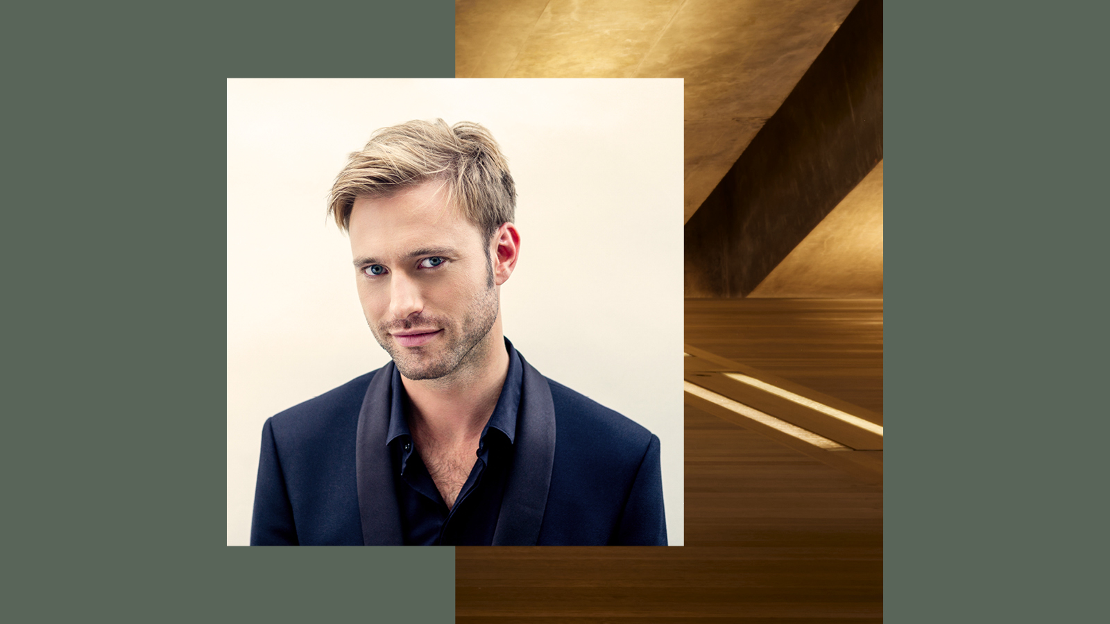 Benjamin Appl a German baritone in a blue tuxedo.