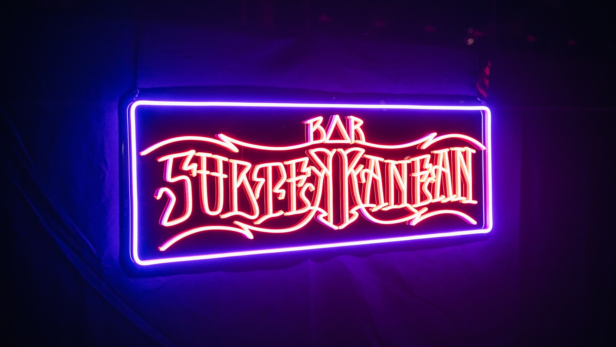 Close up of red and blue LED 'Bar Subterranean' light