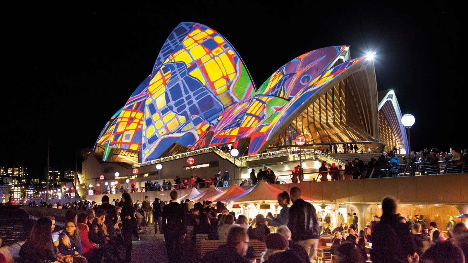 The sails of the Sydney opera house lit in a colourful pattern for Vivid live event.