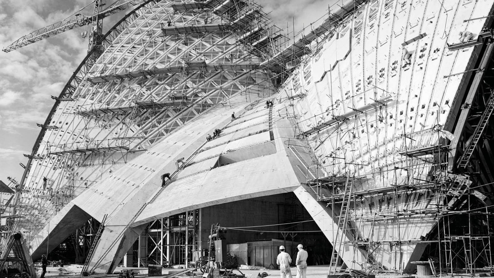 The sails of the Opera house under construction.