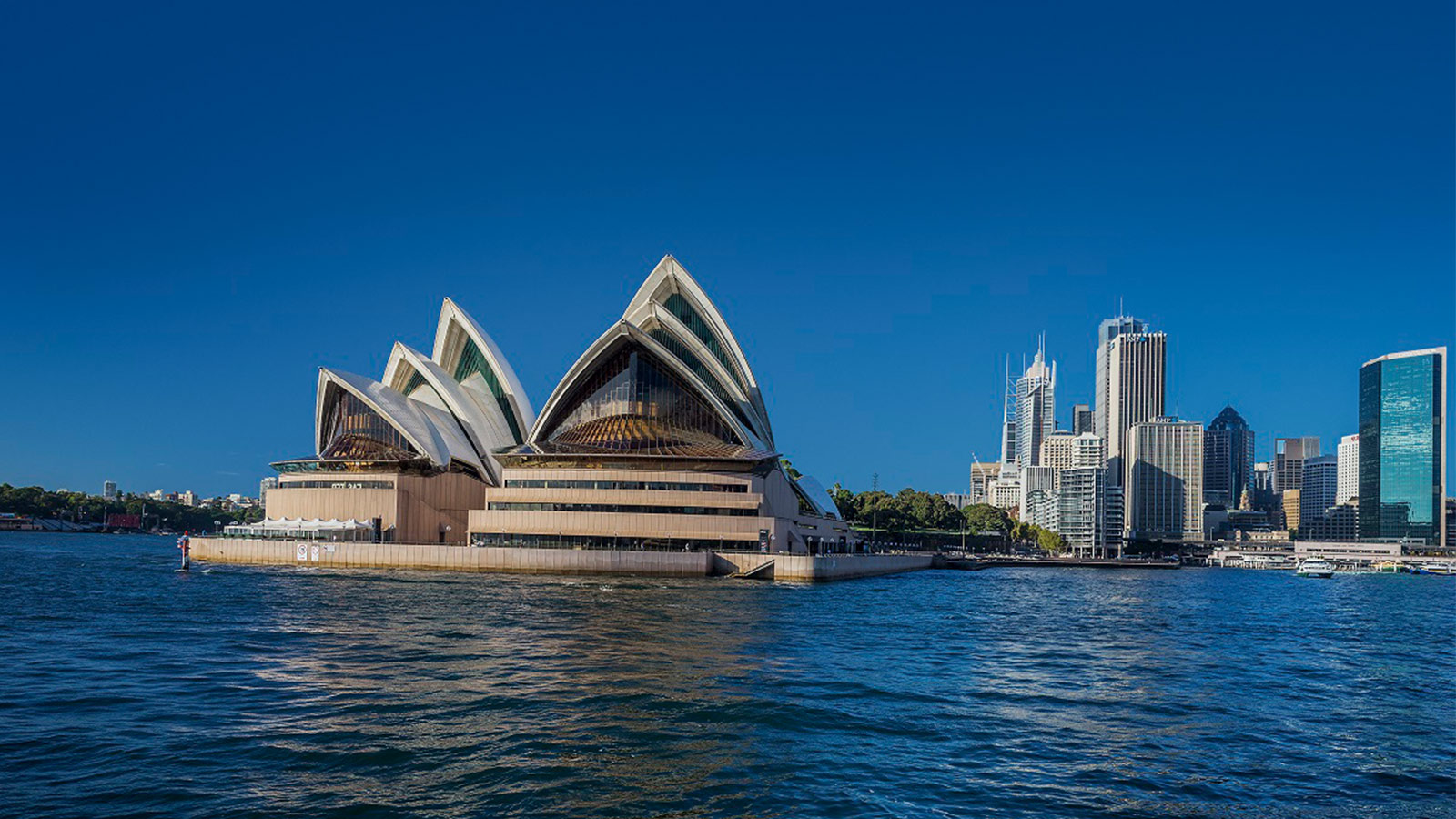 A long shot of Sydney opera house and Sydney CBD.