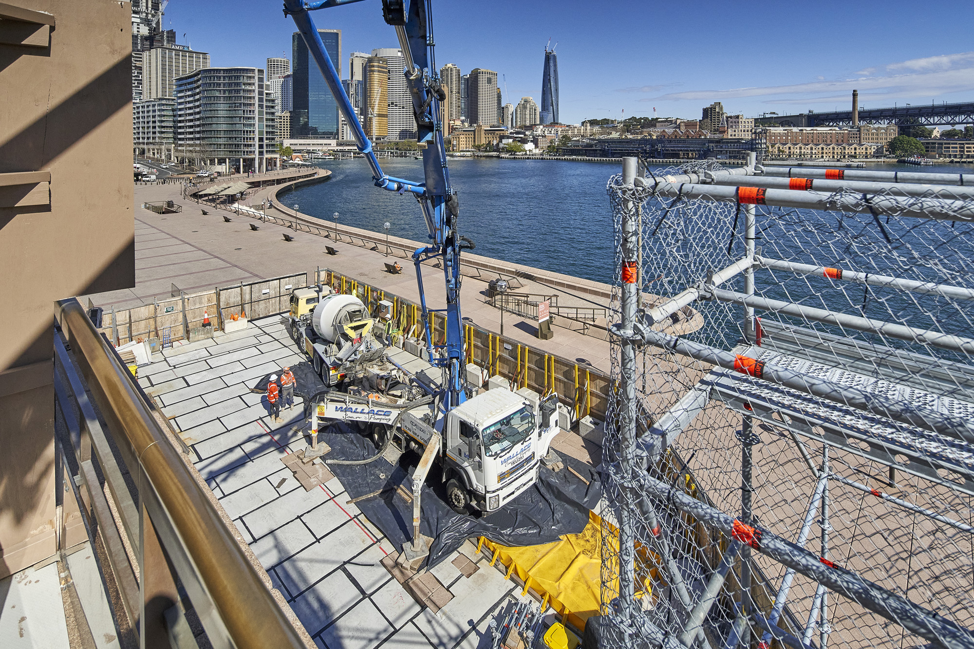 Concrete being transported into the Concert Hall with a boom pump.