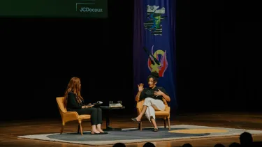 Zadie Smith speaks on stage.