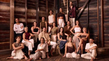 A group photo of all Bangarra theatre dancers.