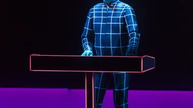 A man playing a piano.