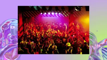 A crowd is gathered in a busy club.