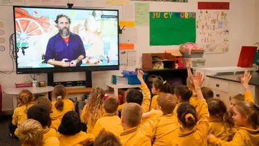 Kids learning in a digital classroom.