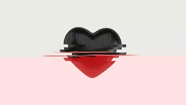A graphic of a cartoon heart. The top half is black and a static effect separates it from the red base of the heart