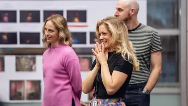 Two women and a man who are in the cast of Sweeney Todd during a rehearsal.