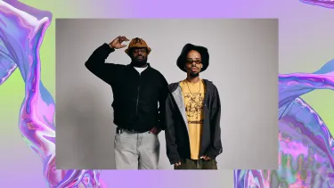 Two black men stand against a gray background; one wears a cap and jacket, the other has a casual outfit. The image overlays a background of a purple iridescent swirl, looking like water.