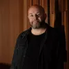 Stuart Buchanan a Head of Digital Programming at Sydney opera house in a black jacket.