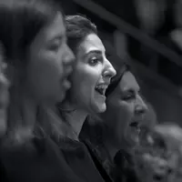 A group of women singing.