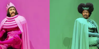Two individuals dressed in monochromatic outfits sit on pedestals; one in pink with a crown on the left, and one in green with a crown on the right, both in similar regal poses against matching backgrounds.