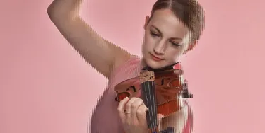 An artist playing a violin, against a pink background.
