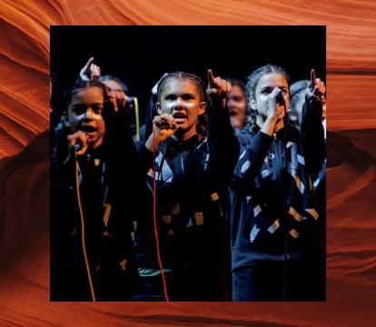 A group of girls singing.