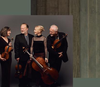 A group of musicians in black holding their instruments.
