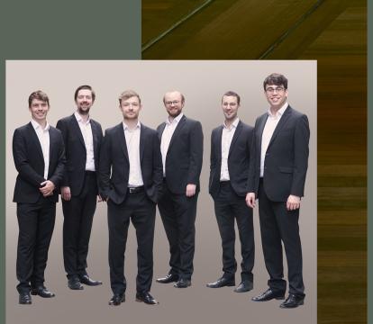 A group of six men in black suit.