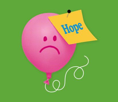 A pink balloon with a sad face on it has a post it note saying 'hope' pinned into it.