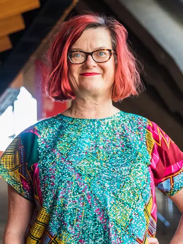 Fiona Winning - Director, Programming at Sydney opera house in a colourful dress.