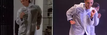 A screenshot from a movie of a man wearing a transparent coat next to an actor wearing the same.