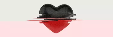 A graphic of a cartoon heart. The top half is black and a static effect separates it from the red base of the heart