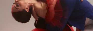 A danseur and a ballerina doing ballet.