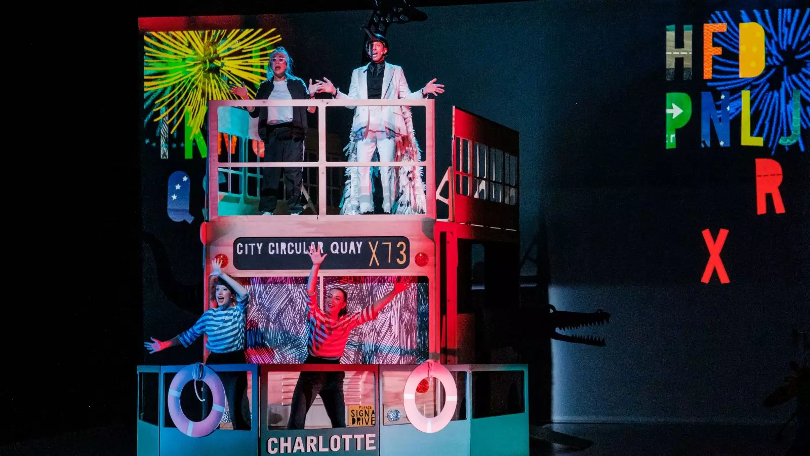 People dancing on a tour bus